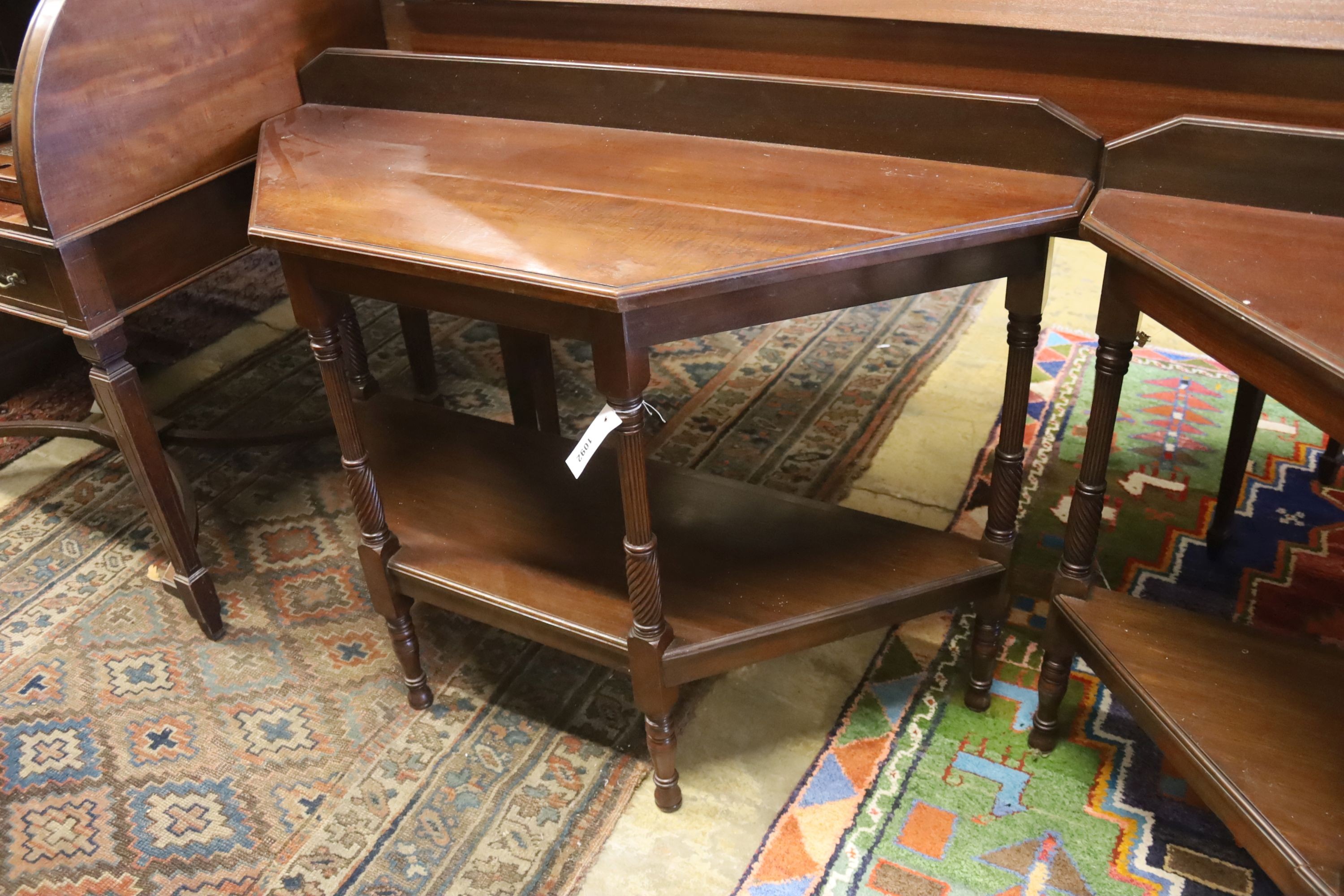 A pair of late Victorian style mahogany two tier side tables, (altered) width 106cm, depth 40cm, height 78cm